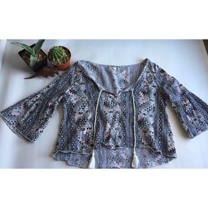 Cropped and patterned front tie top